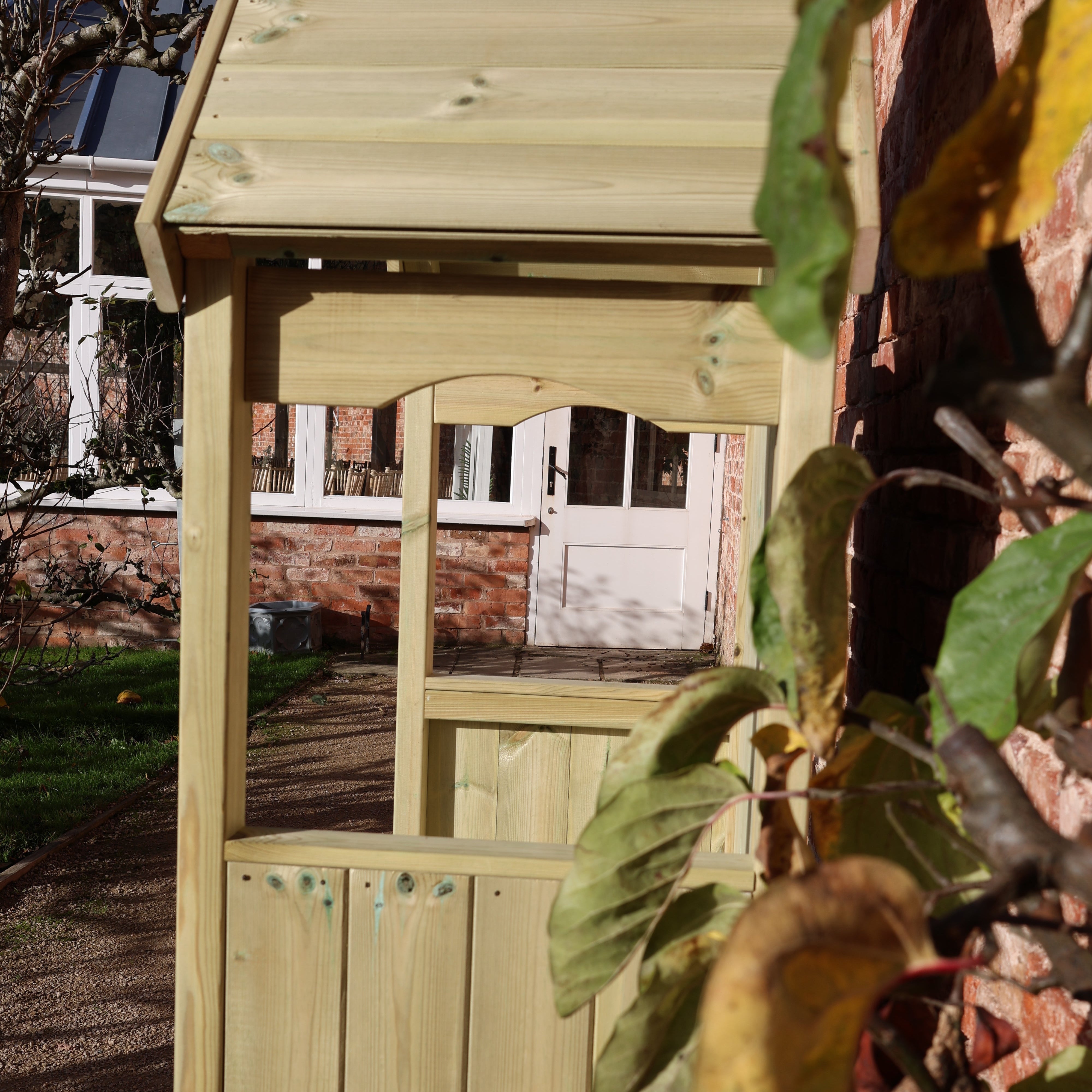 Wooden garden arbour with storage