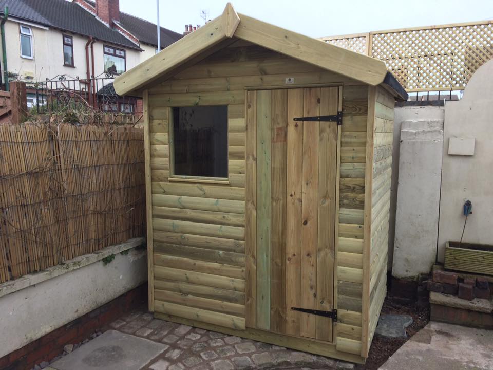 Pressure treated apex shed with front window and loglap timber cladding