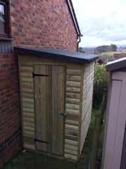 Small pressure-treated pent garden shed with timber door