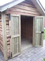 Waney lap larch gazebo with cedar shingle roof