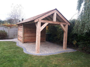 Larch gazebo with cedar shingle roof and storage section