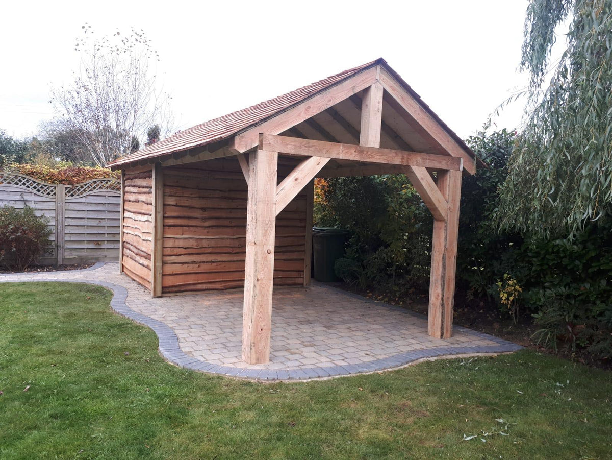 Larch gazebo with cedar shingle roof and storage section