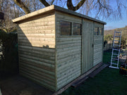 Large heavy-duty pent shed with wide central door and front windows