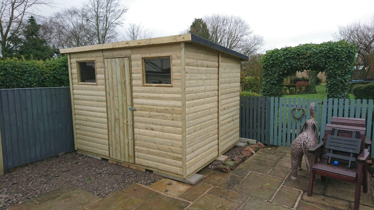 Pressure-treated pent shed with centre door and front windows
