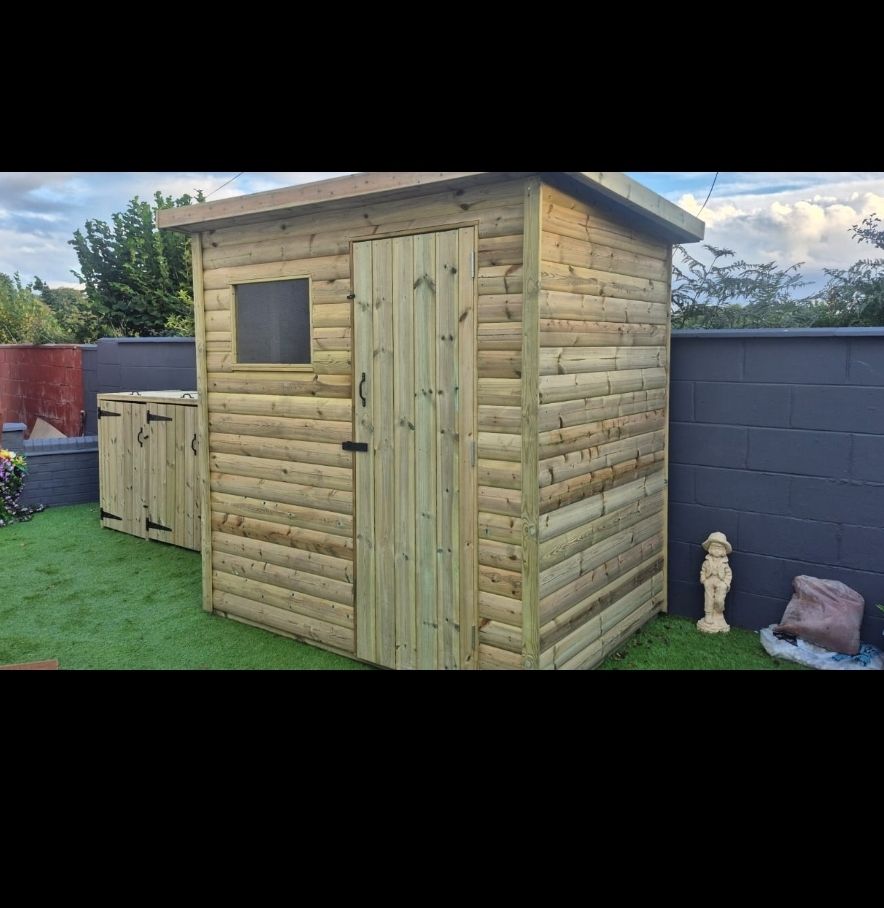 Timber pent shed with right-hand single door and front window