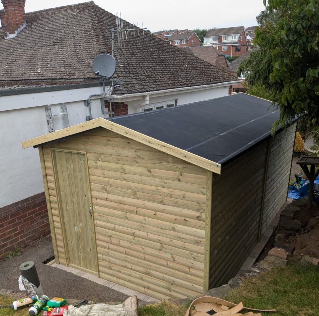 9x16 timber garage with rear personnel door