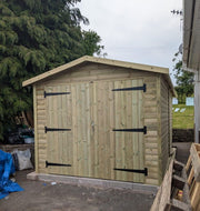 9x16 pressure treated wooden garage with apex roof