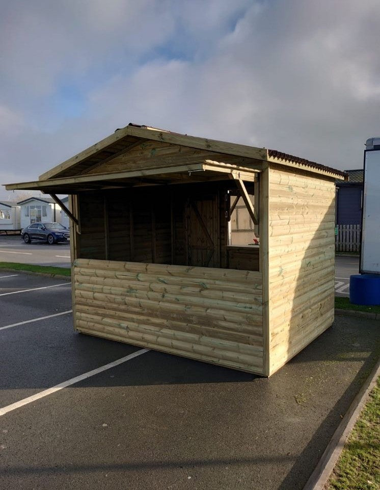 Timber market chalet with double serving hatches