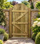 Rear of curved top tongue and groove garden gate showing timber bracing