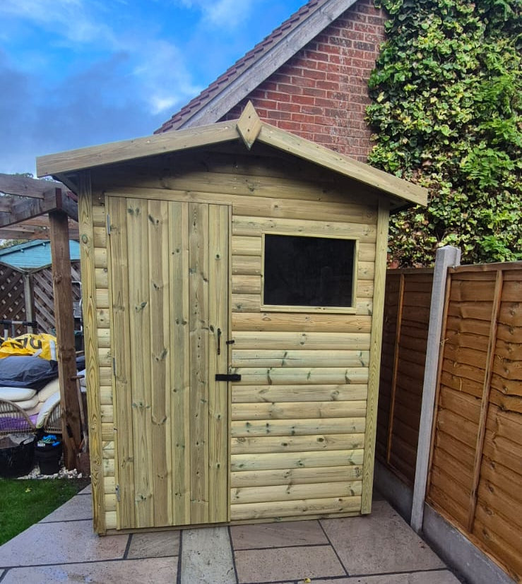 Pressure-treated apex timber shed with door left and front window