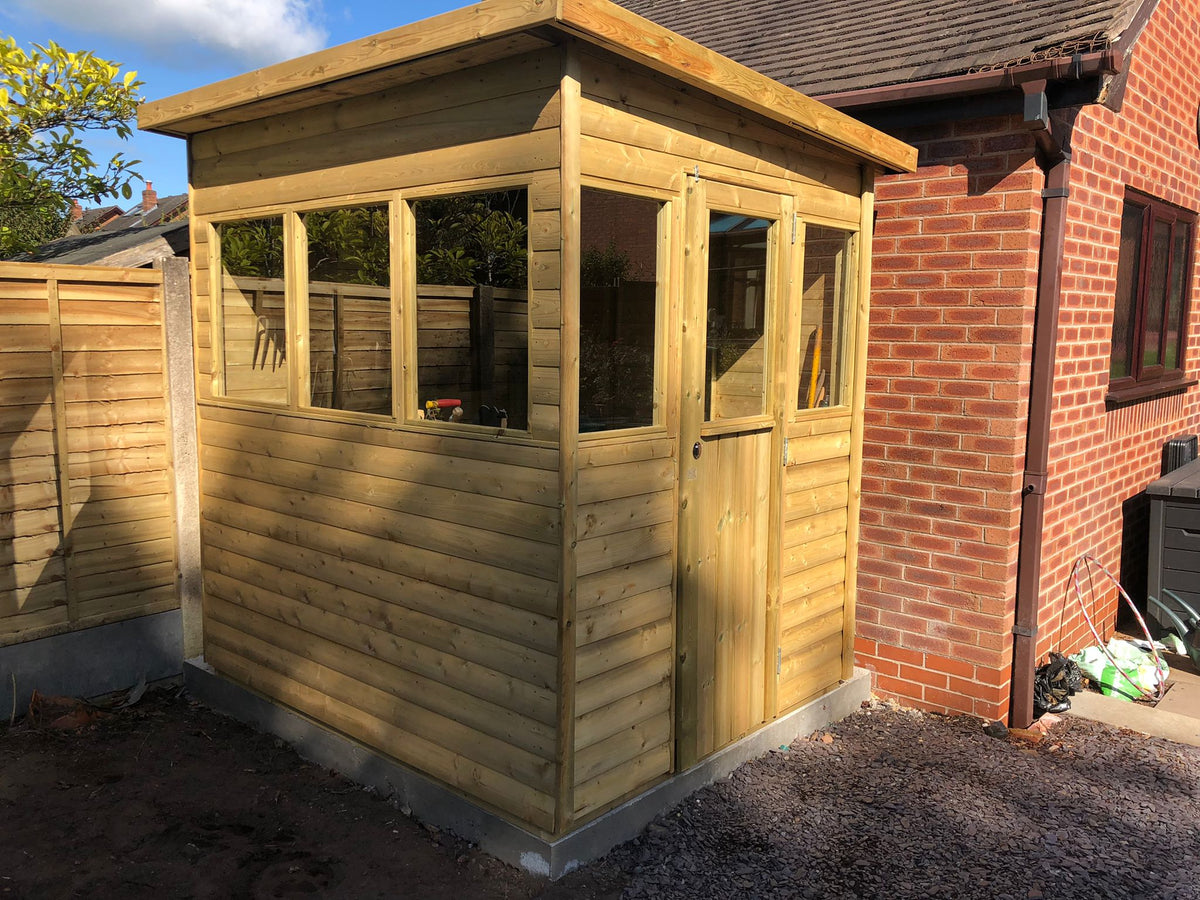7x6 timber potting shed with end door and windows