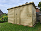 Pent Shed Double Doors installed in a garden