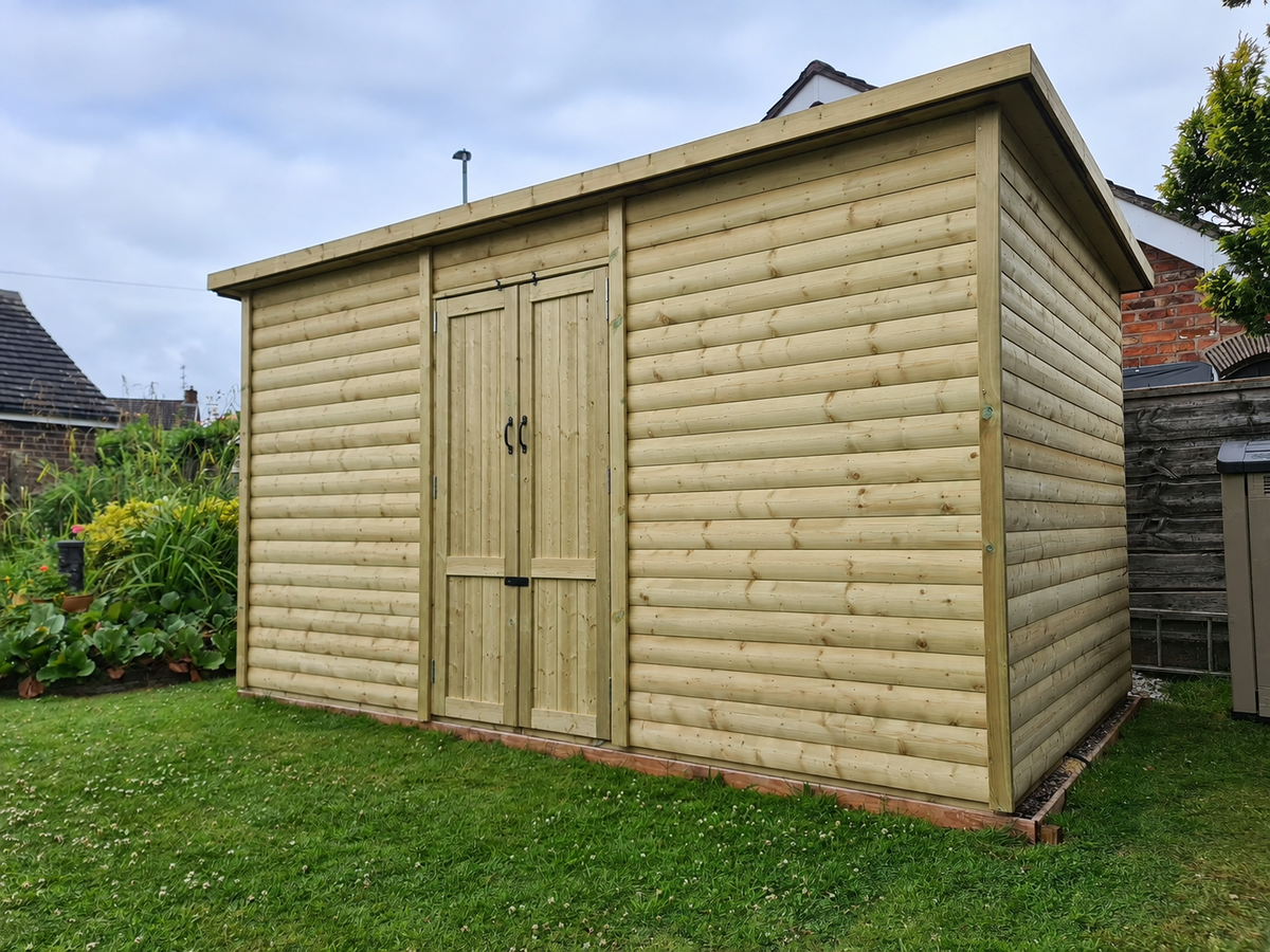 Pent Shed Double Doors installed in a garden