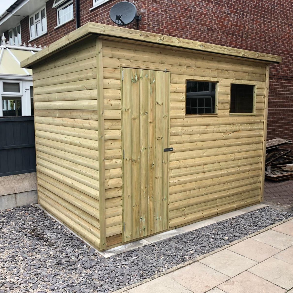 Heavy duty pent garden shed with door positioned to the left