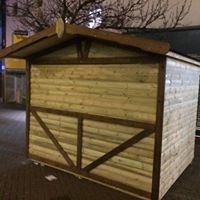 Pressure-treated timber market chalet